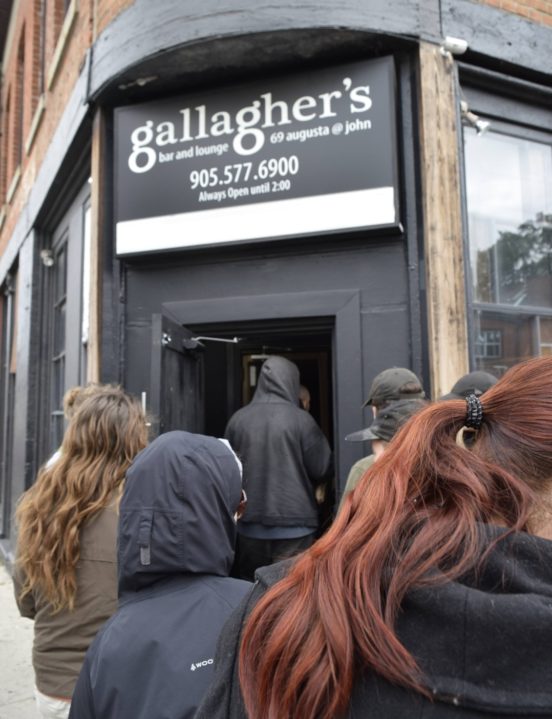 Hamilton Reclaim Your Pay campaign enters Gallagher's Bar, November 2018 | Image courtesy Hamilton IWW